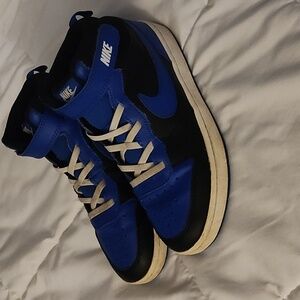 Size 2.5 Blue and black Nike shoes for boys